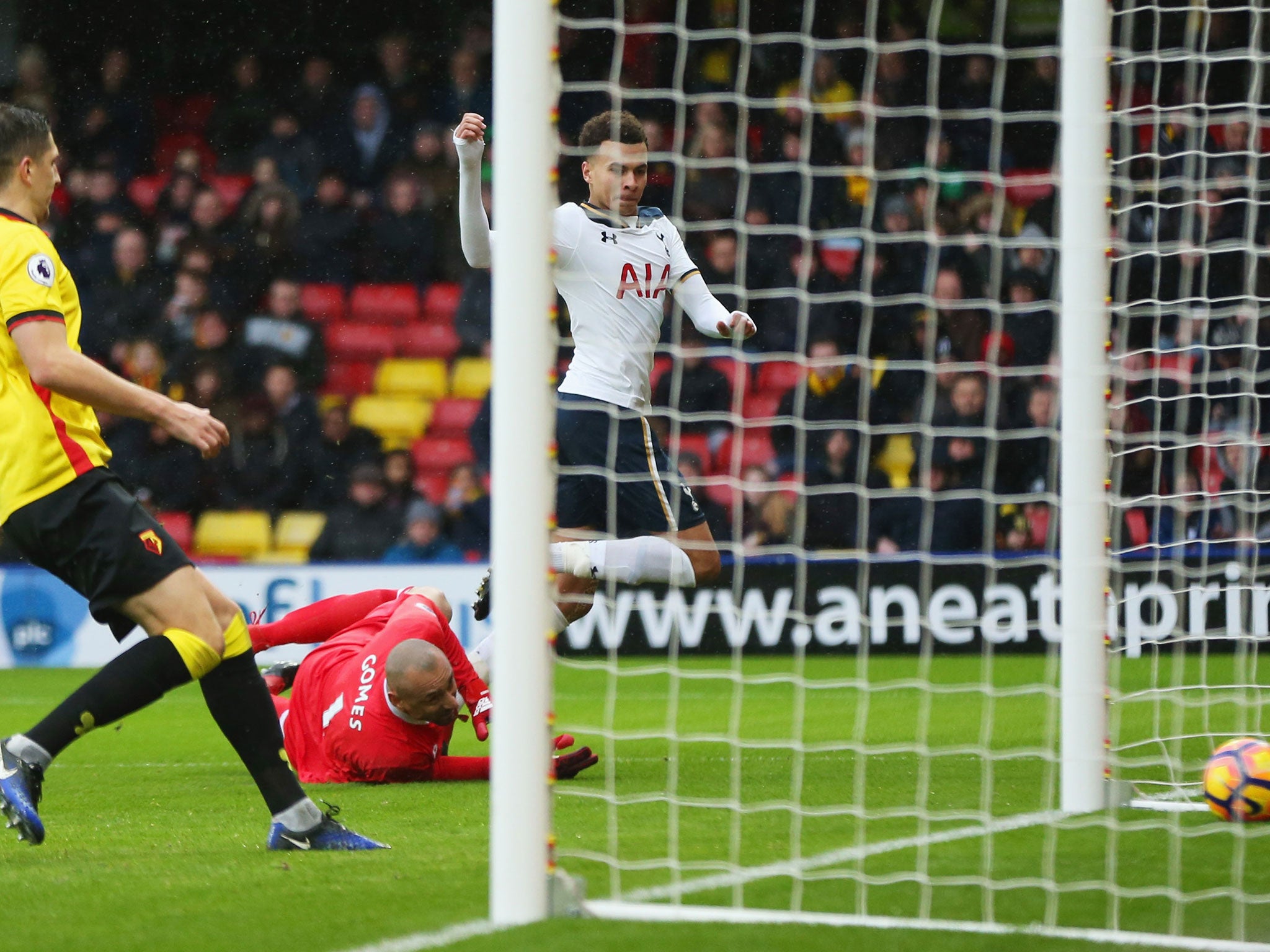 Alli strokes home Tottenham's fourth from a tight angle