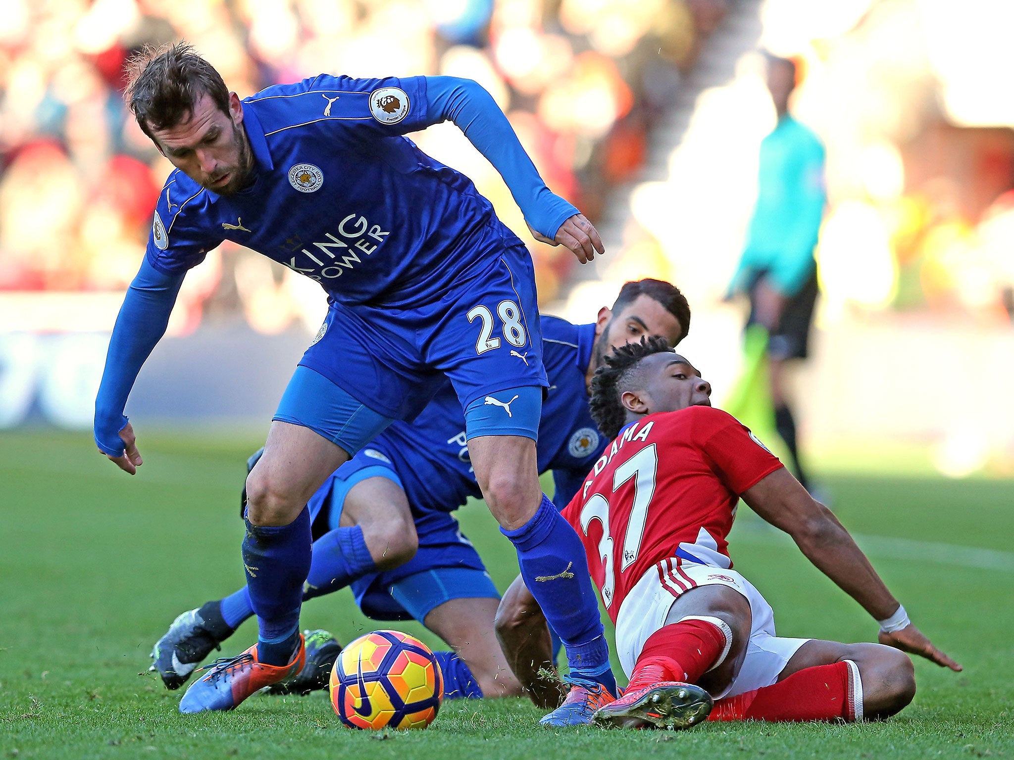 Riyad Mahrez, Christian Fuchs and Adama Traore all clash for the ball