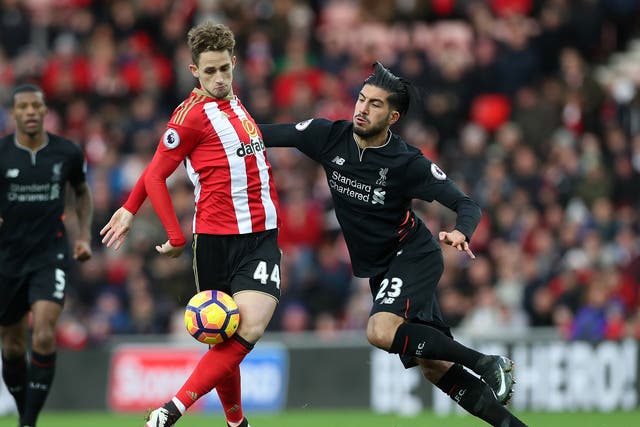 Januzaj and Can battle for the ball at the Stadium of Light
