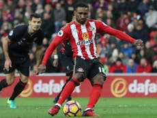 Defoe's penalty double earns Sunderland draw against Liverpool