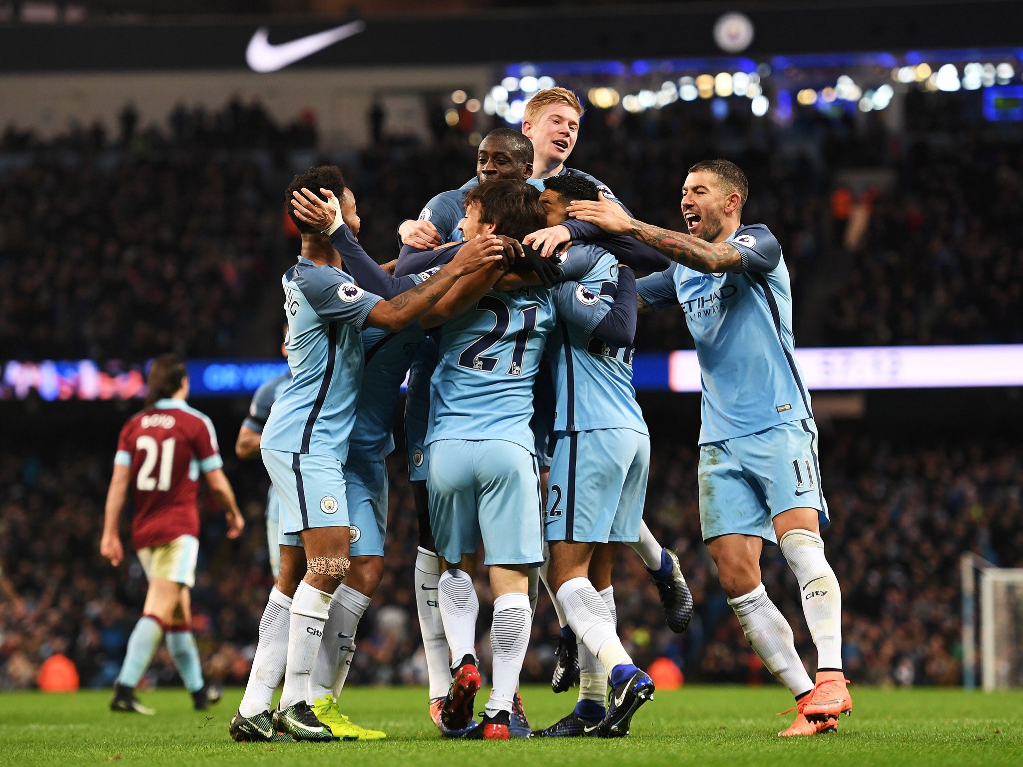 Manchester City players congratulate Gael Clichy after the Frenchman put the home side ahead at the Etihad Stadium