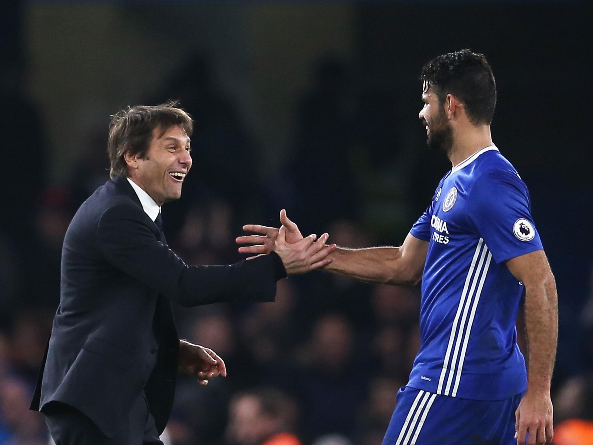 Chelsea manager Antonio Conte congratulates Diego Costa after their side's win over Stoke on New Year's Eve