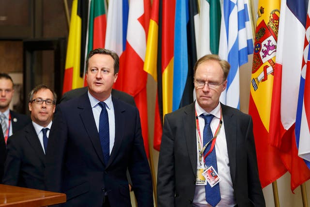Sir Ivan (right) with former Prime Minister David Cameron at a summit in Brussels in 2016