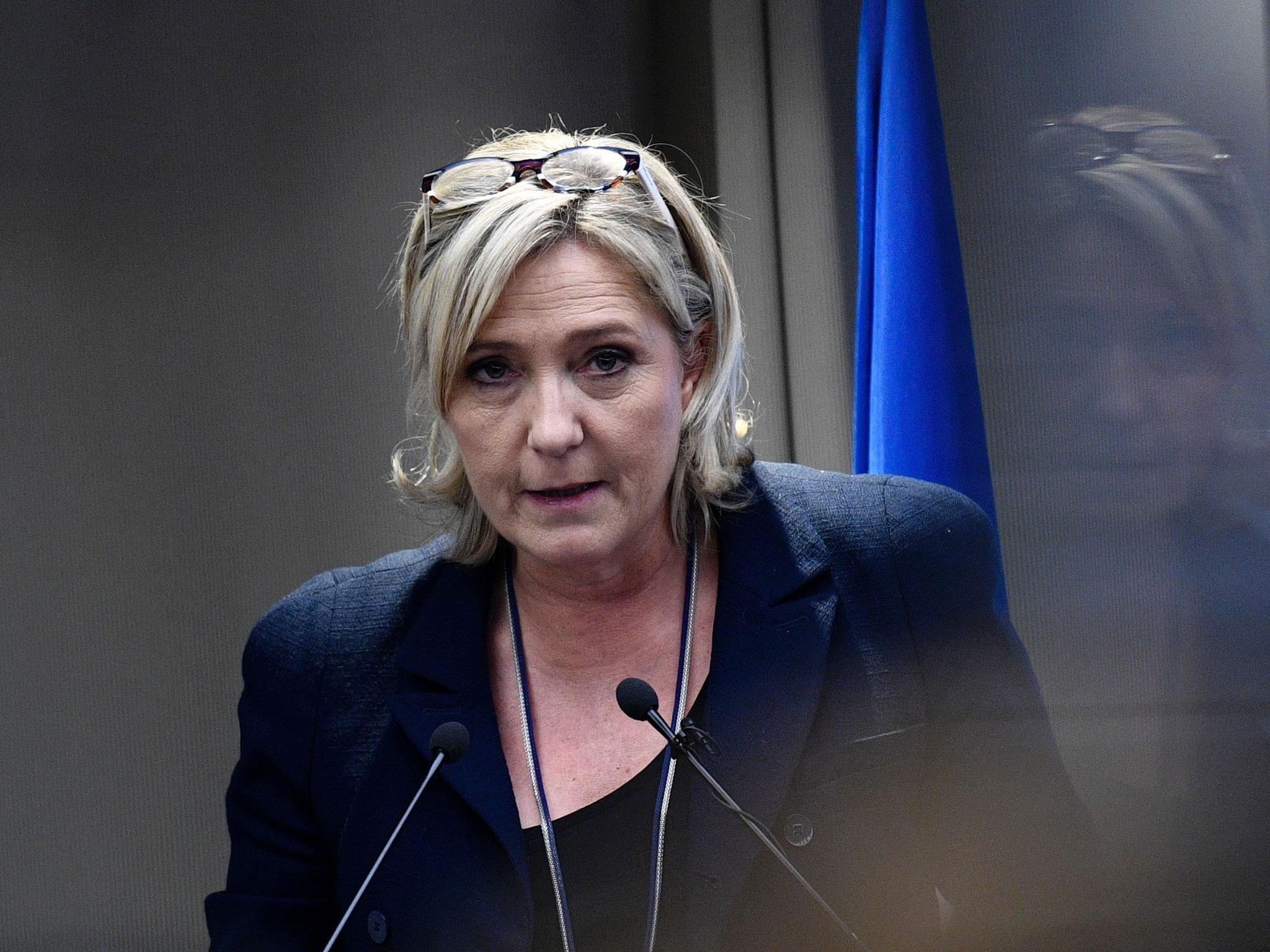 French far-right Front National (FN) party president, member of European Parliament and candidate for France's 2017 presidential election, Marine Le Pen delivers a speech during a meeting about healthcare, on December 9, 2016