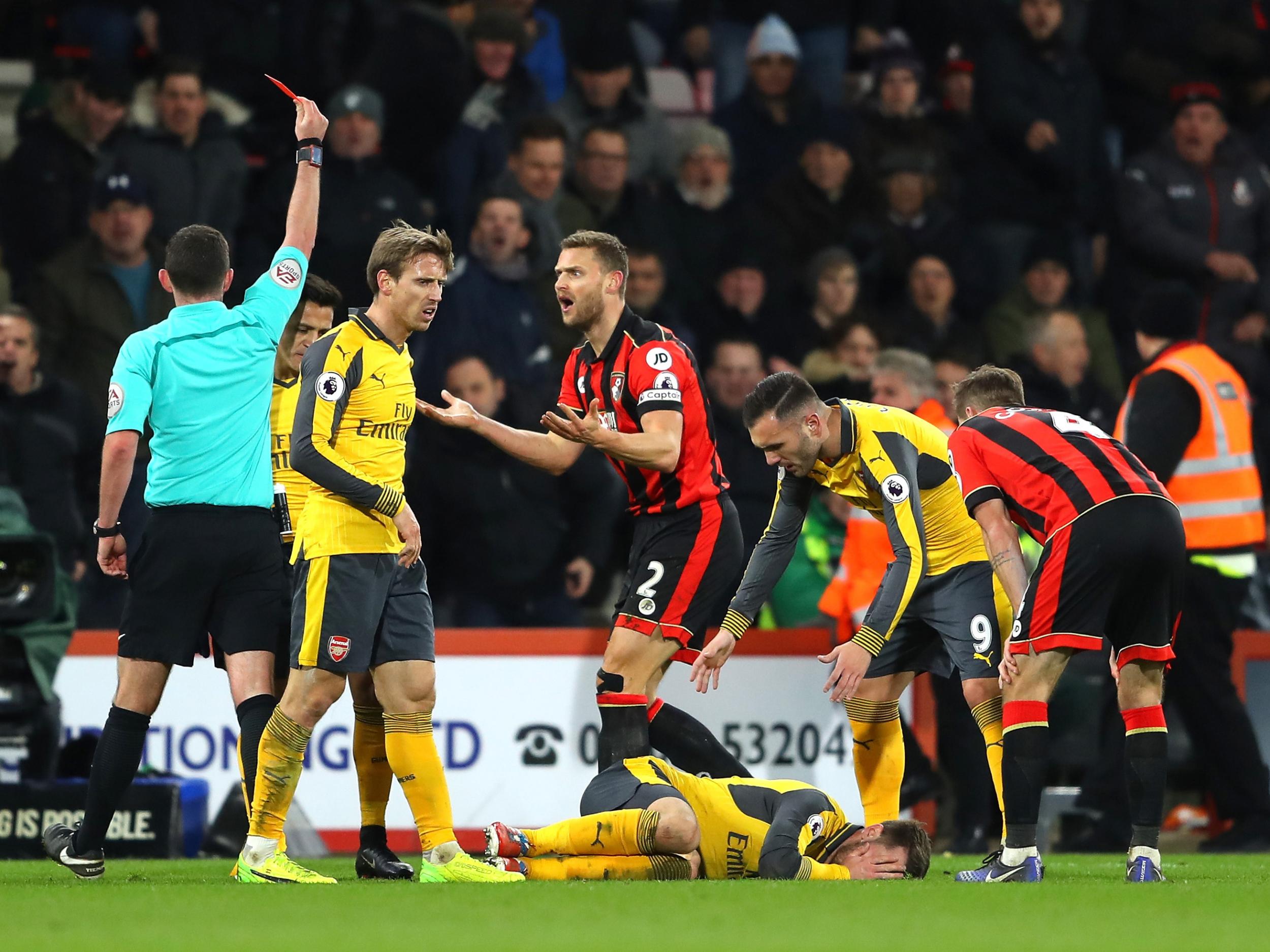 Simon Francis was shown a straight red for his tackle on Aaron Ramsey