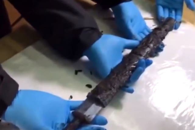 The 2,300-year-old sword was still sharp and shiny
