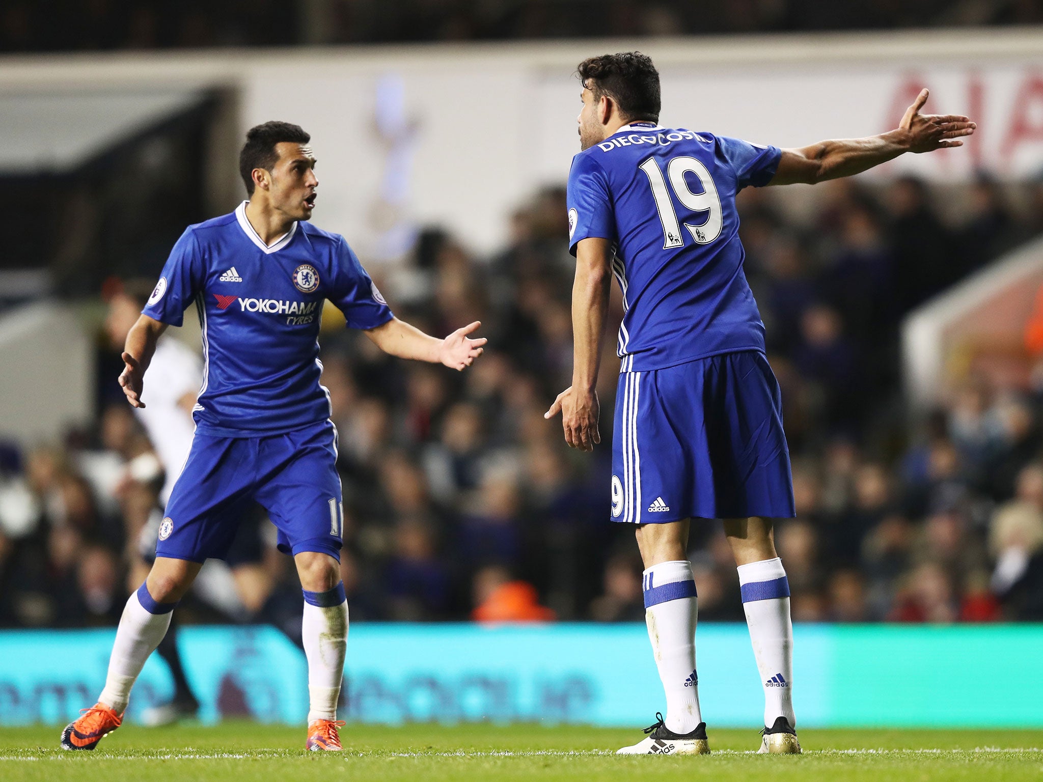 Costa and Pedro argue during the first-half of their game against Tottenham on Wednesday night