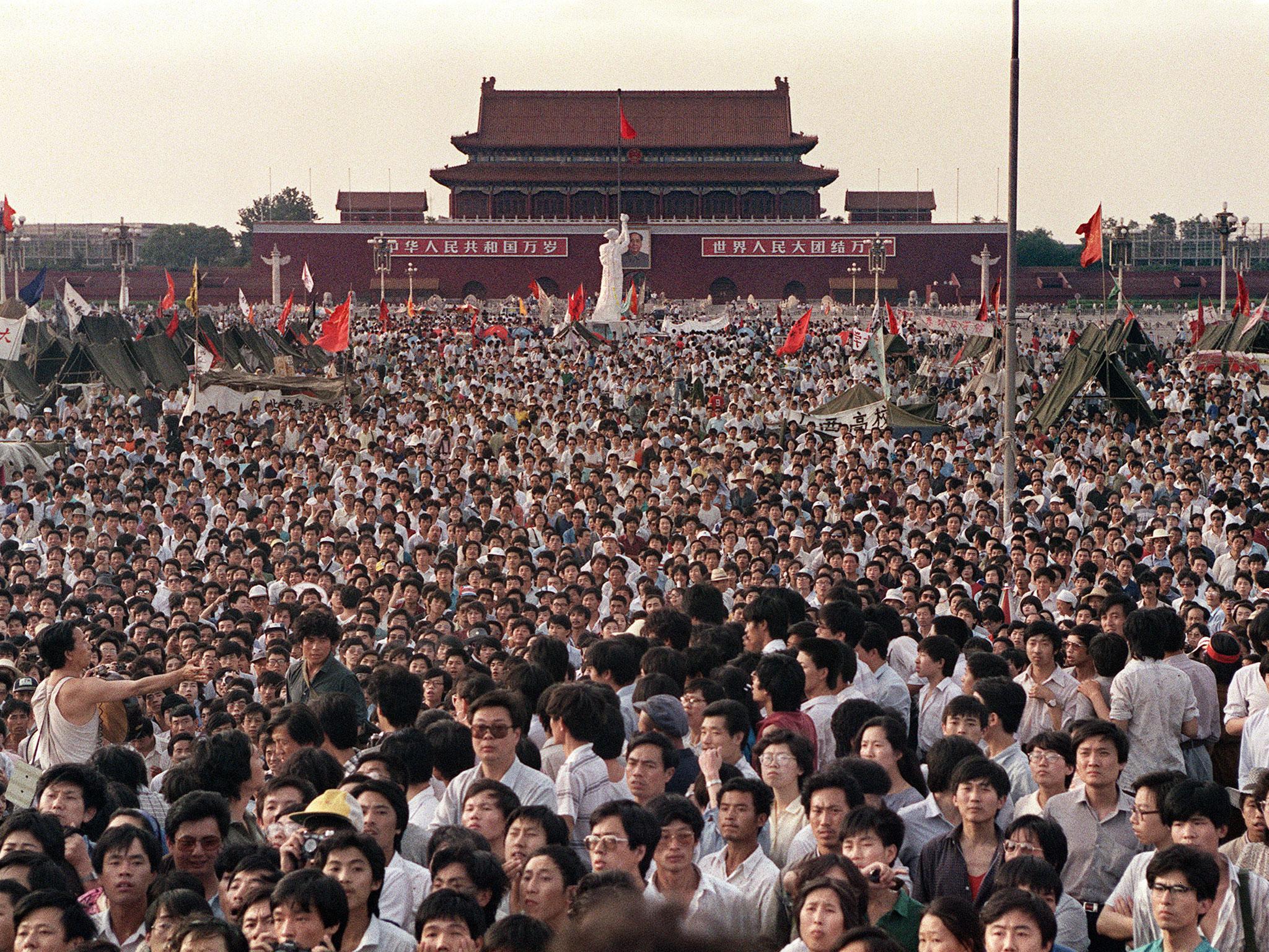 Hundreds of thousands of Chinese gathered in Tiananmen Square to demand democracy despite martial law in Beijing