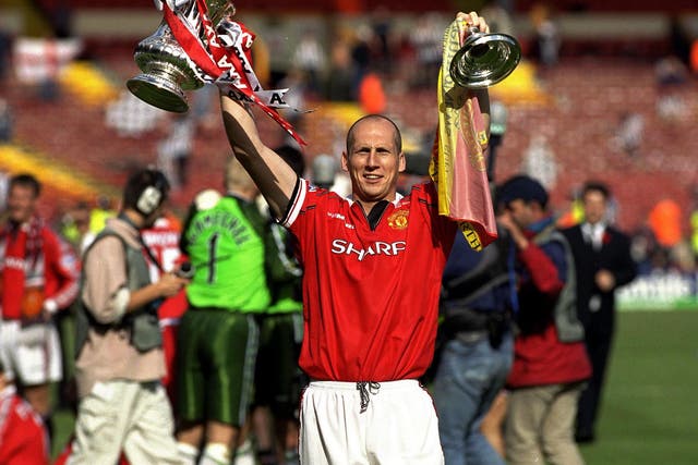 Stam won the FA Cup with United as part of the club's famous treble in 1999