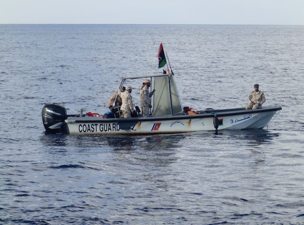 A Libyan coastguard boat observing a rescue by MSF's Bourbon Argos ship on 4 November 2016