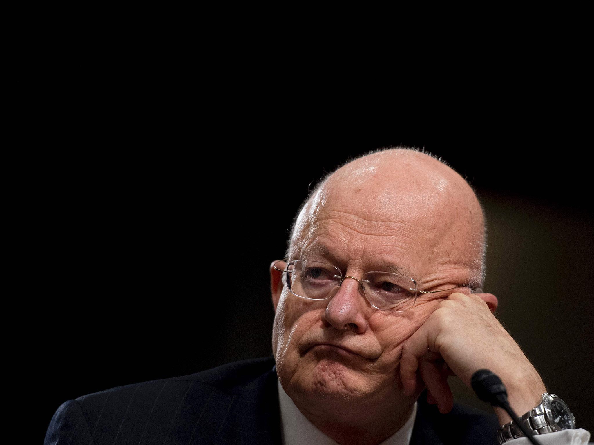 James Clapper testifies before the Senate Armed Services Committee on Capitol Hill yesterday