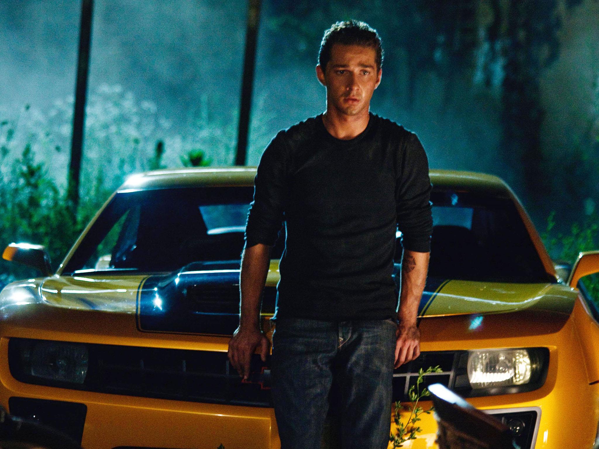 Shia LaBeouf with a vintage yellow Camaro in ‘Transformers’