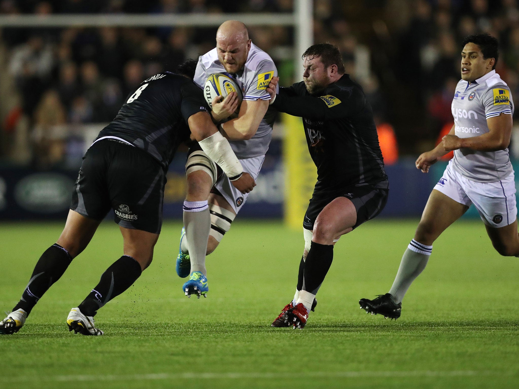 Matt Garvey looks for a way through the Newcastle defence