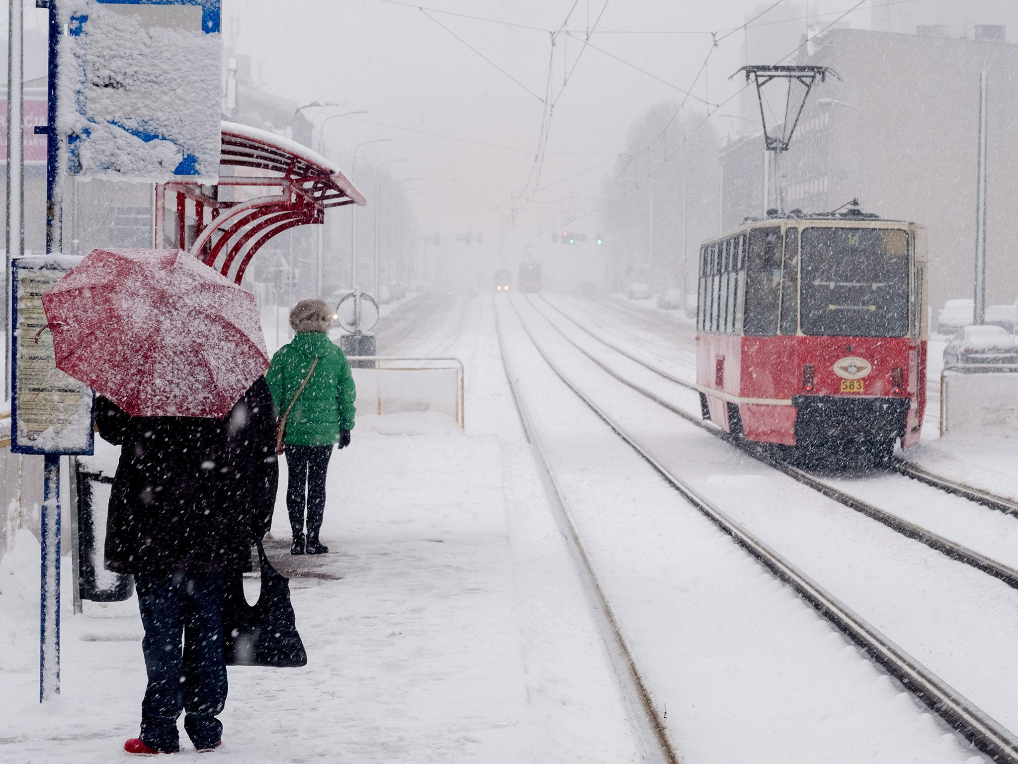 Pedestrians making their way during a heavy snowfall in Katowice, Silesia, southern Poland, 04 January 2017.