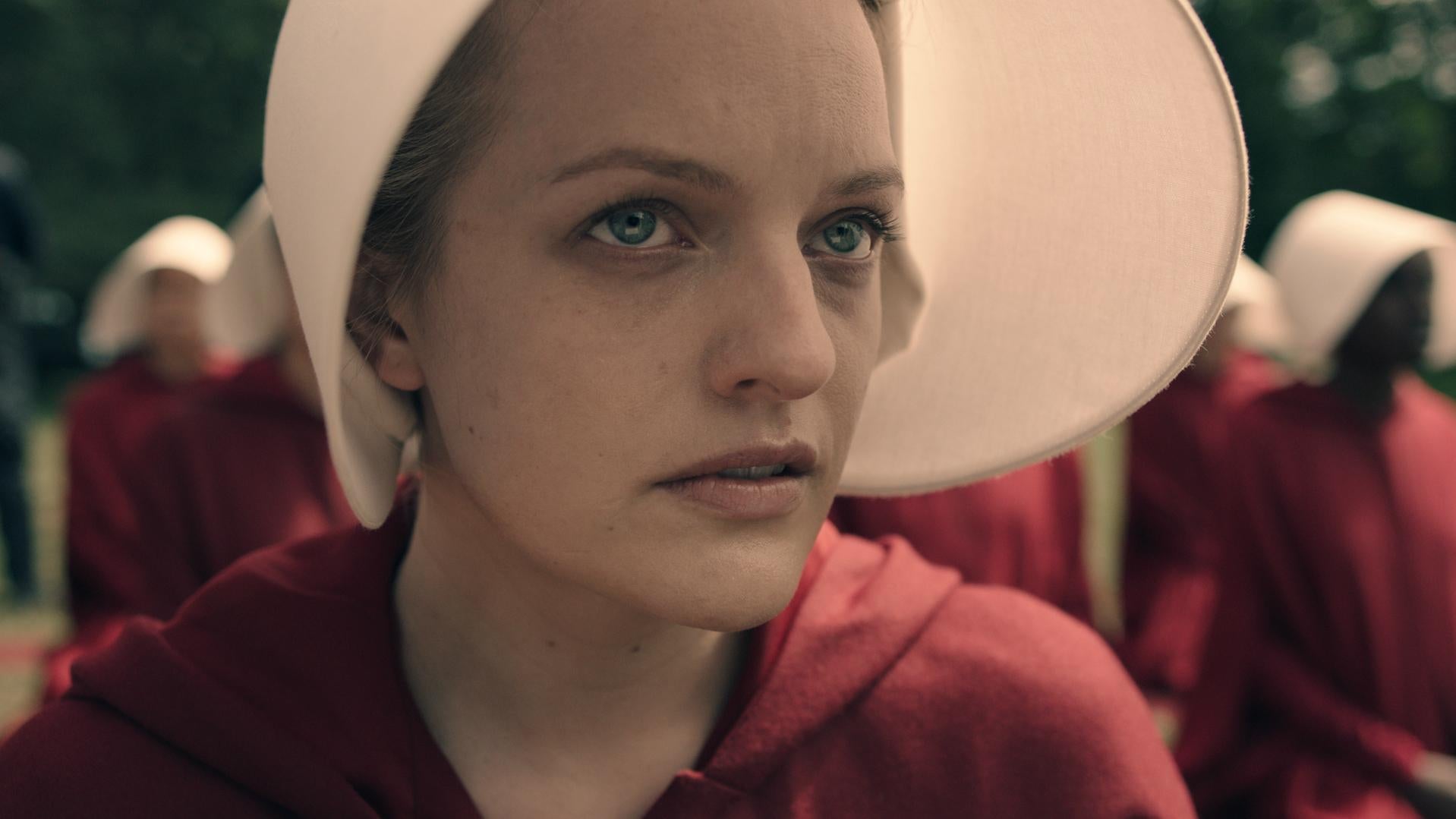 Moss plays Offred in 'The Handmaid's Tale' who is shipped off to be trained as a breeder to help infertile couples