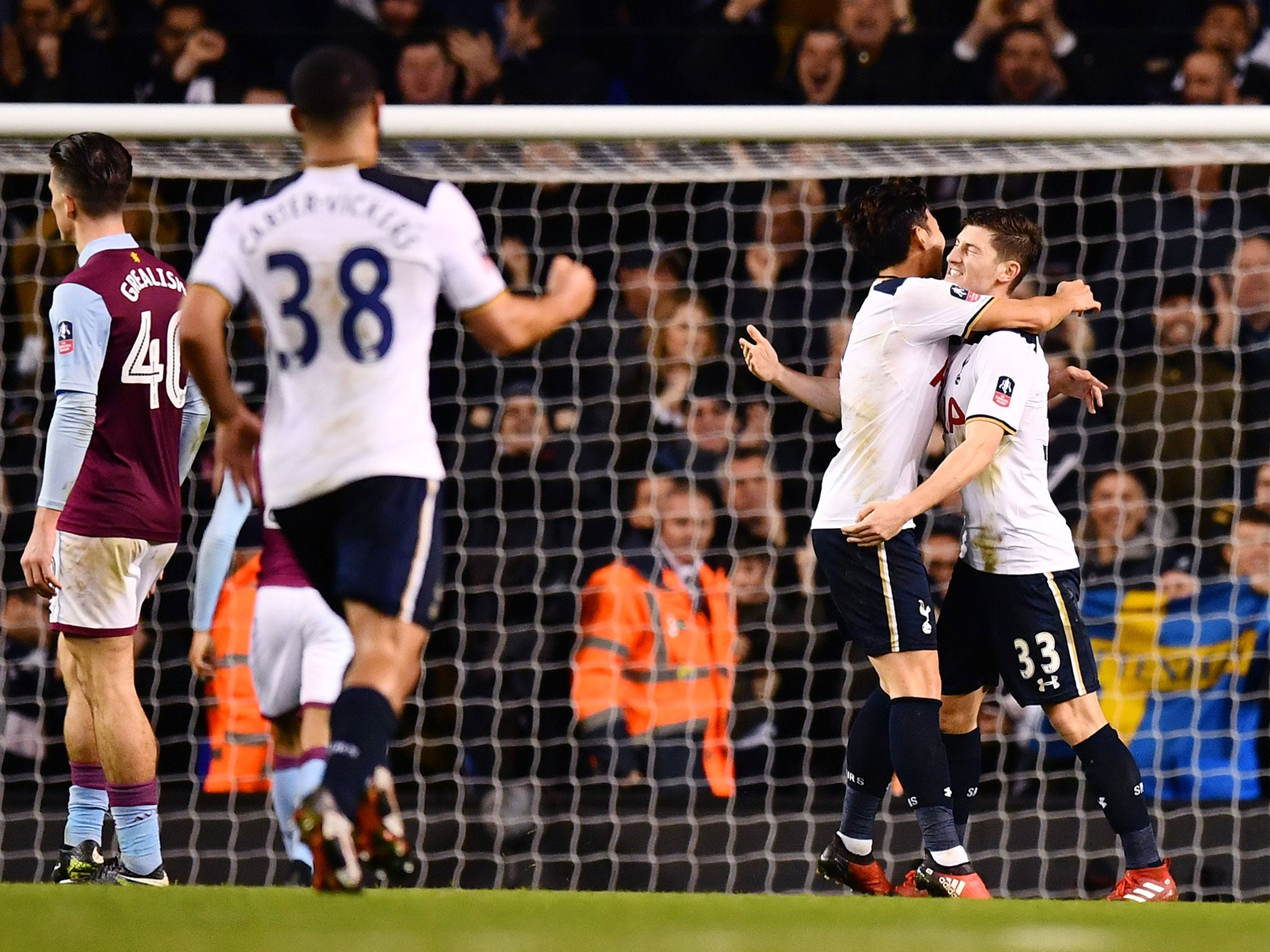 Ben Davies celebrates with team mates after putting Spurs ahead with a well-taken header