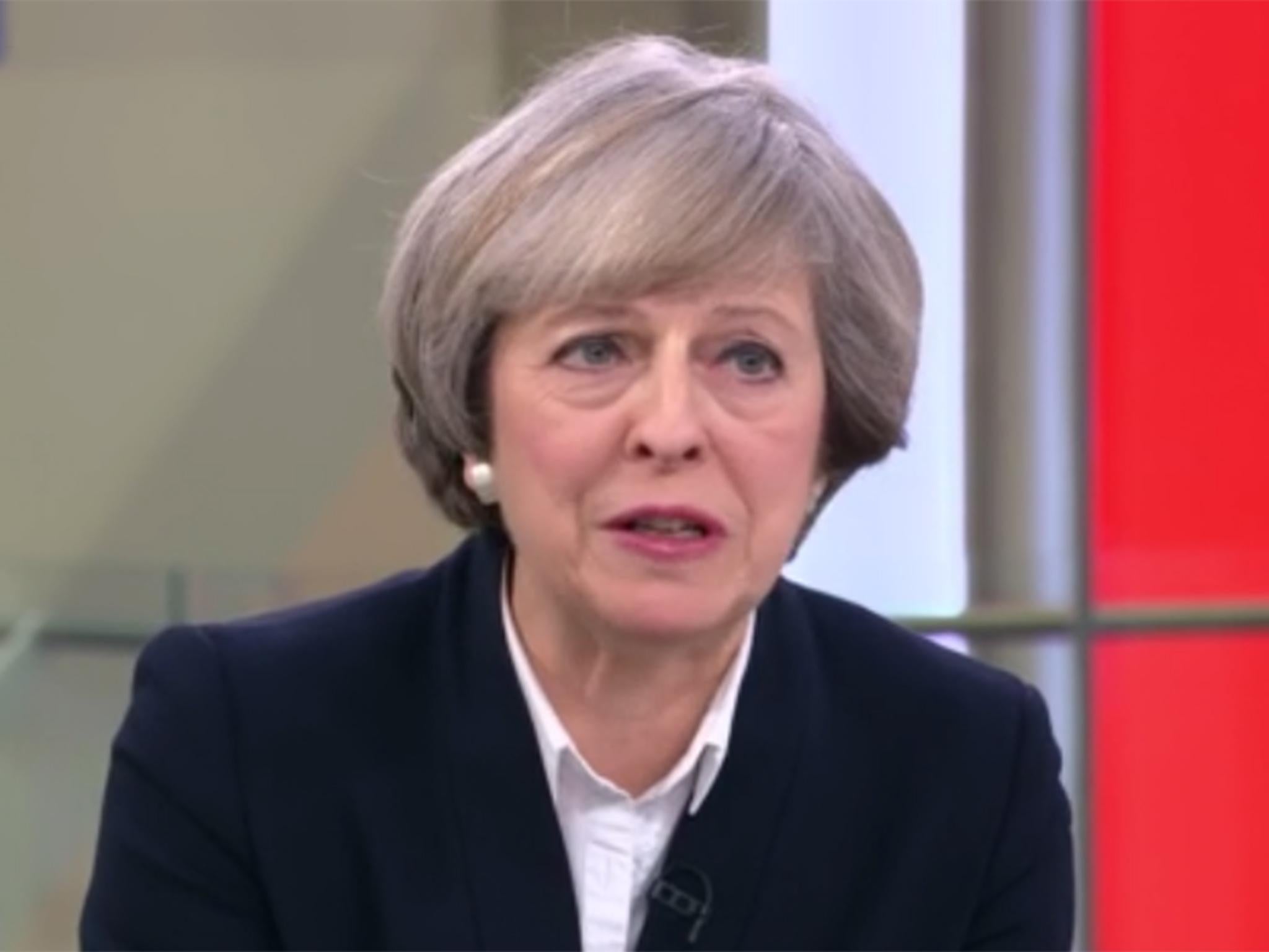 Theresa May said America would support Nato despite Donald Trump suggesting otherwise