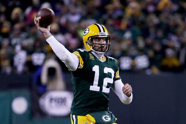 Aaron Rodgers starred as Green Bay Packers defeated New York Giants to reach the divisional play-off round