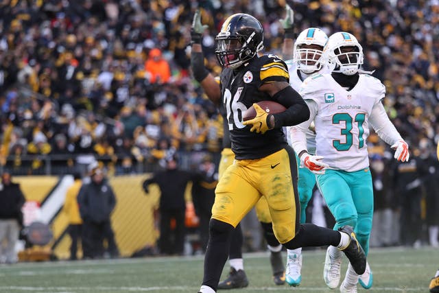 Le'Veon Bell ran in two touchdowns as he broke the Pittburgh record for the most yards in a postseason match