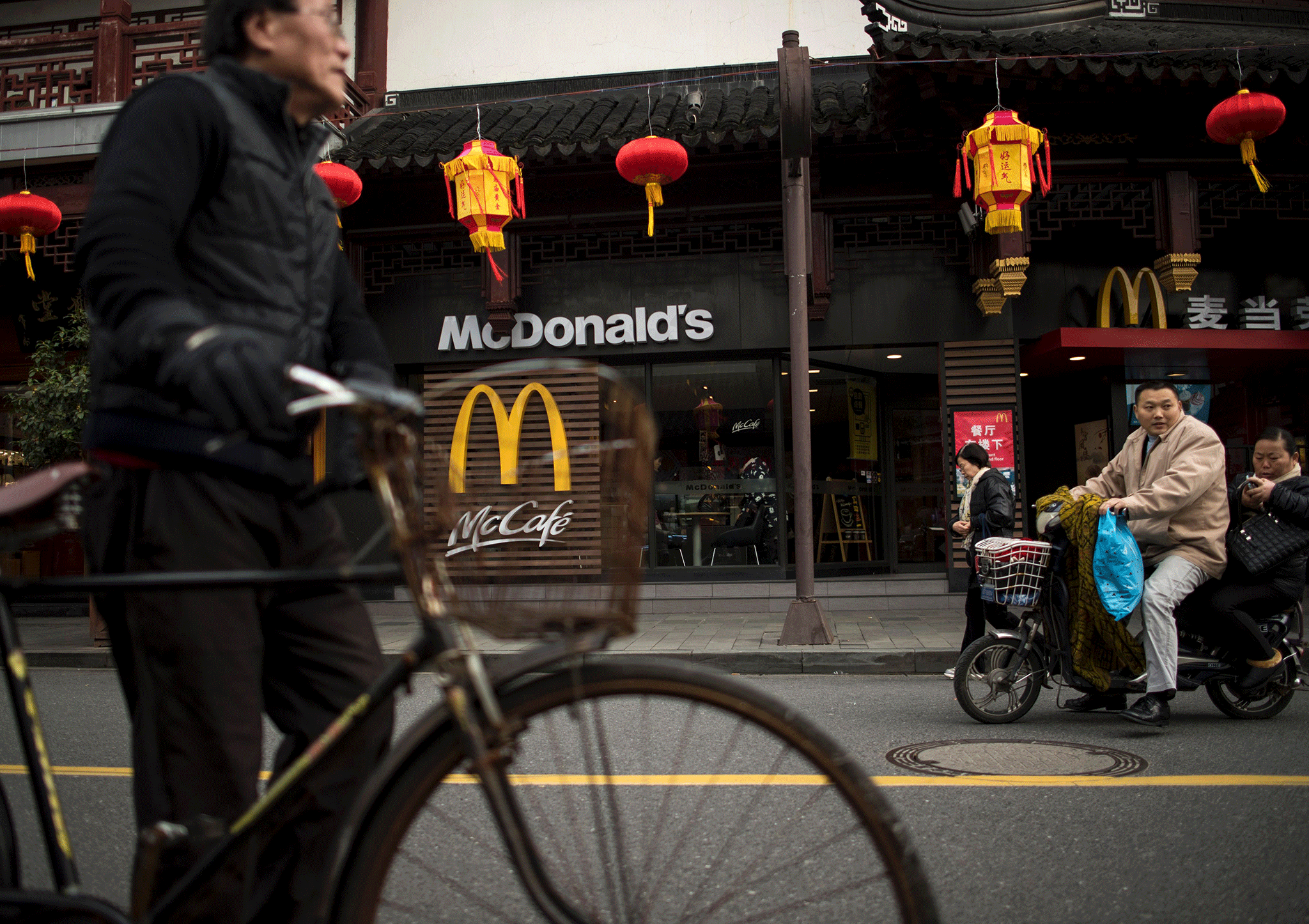 McDonald's mploys more than 120,000 people in China and has more than 2,400 restaurants on the mainland and 240 in Hong Kong