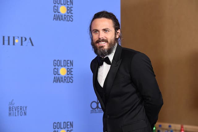 Actor Casey Affleck, winner of Best Actor in a Motion Picture - Drama for 'Manchester by the Sea,' poses in the press room during the 74th Annual Golden Globe Awards
