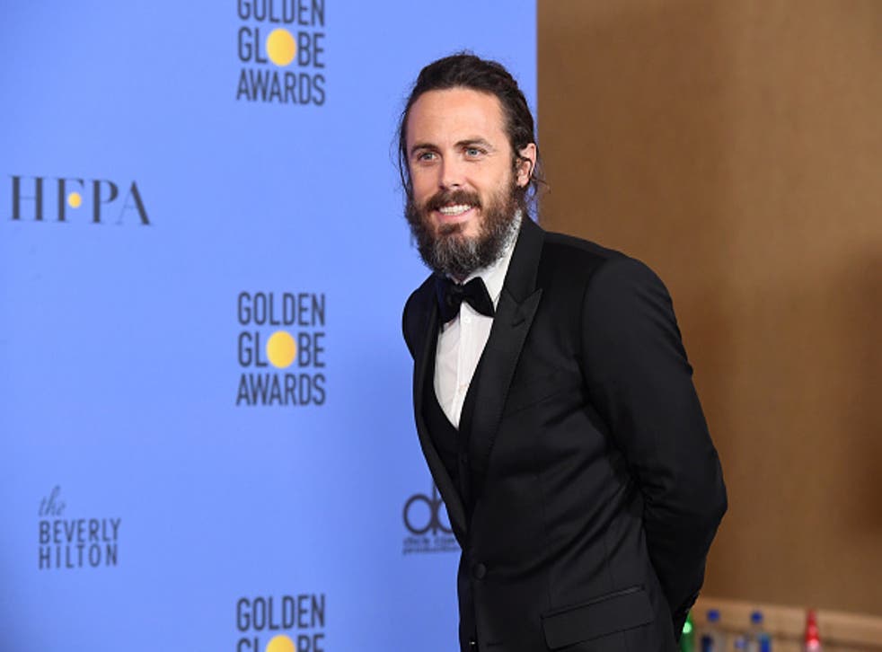 Actor Casey Affleck, winner of Best Actor in a Motion Picture - Drama for 'Manchester by the Sea,' poses in the press room during the 74th Annual Golden Globe Awards