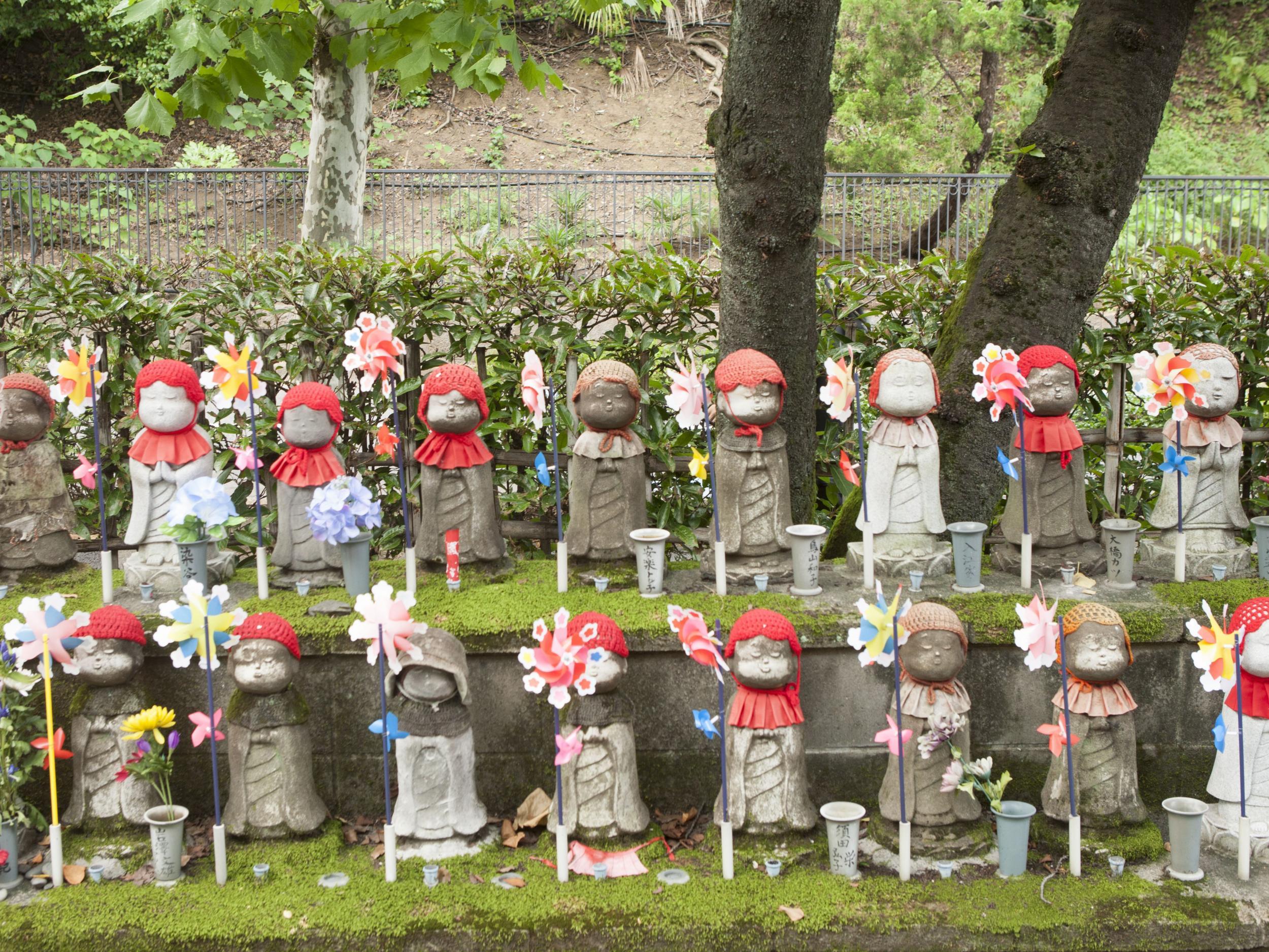Jizo statues at the Zojoji temple in Japan