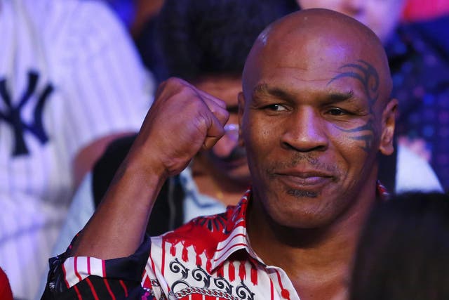 Former Heavyweight boxing champ Mike Tyson attends the fight between Miguel Cotto and Sergio Martinez on June 7, 2014 at Madison Square Garden in New York City. Cotto won by a TKO in the ninth round.