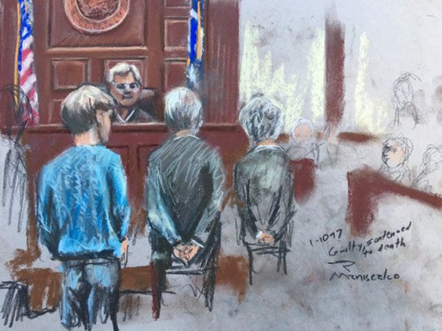 Dylann Roof (left) in court in Charleston, South Carolina on Tuesday