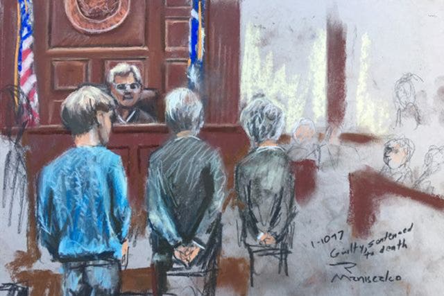 Dylann Roof (left) in court in Charleston, South Carolina on Tuesday
