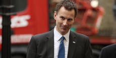 Jeremy Hunt got chased down the road by a reporter and it was awkward