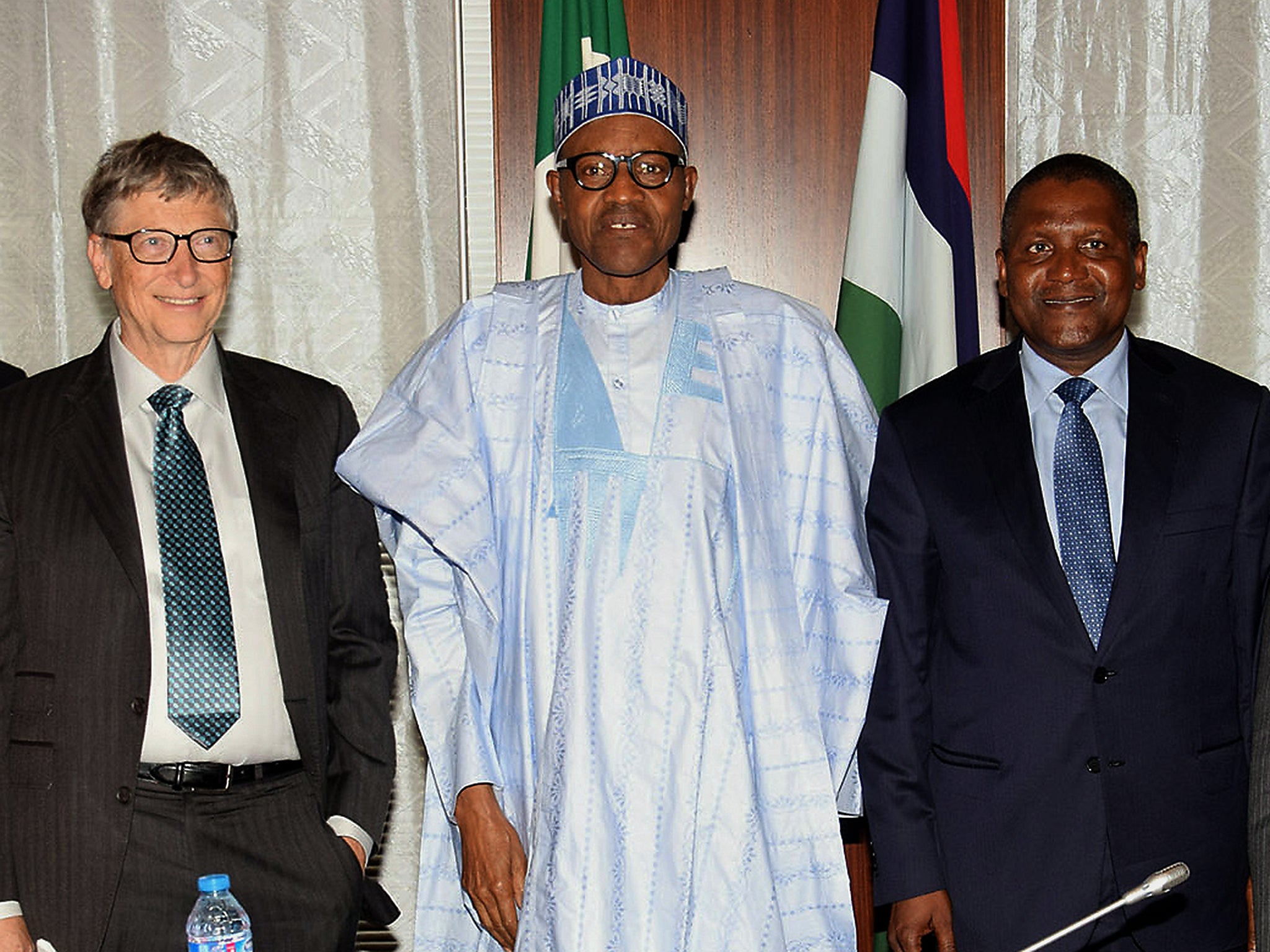 Nigerian President Mohammadu Buhari with Bill Gates and Africa's richest man Aliko Dangote, at the signing of the Abuja Agreement on Polio Eradication