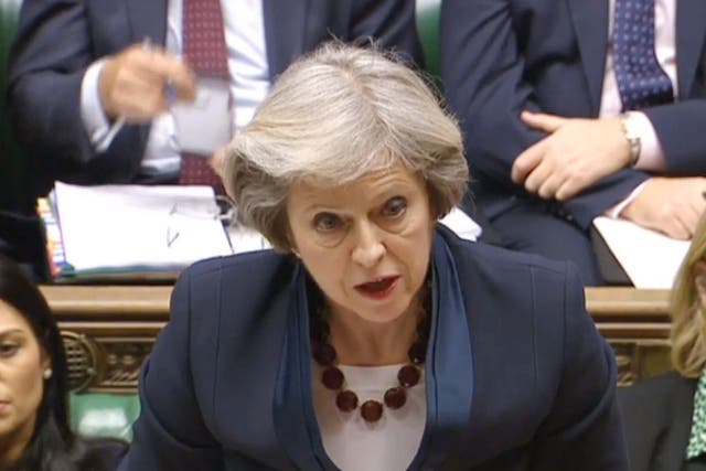 Theresa May speaks during Prime Minister’s Questions in the House of Commons