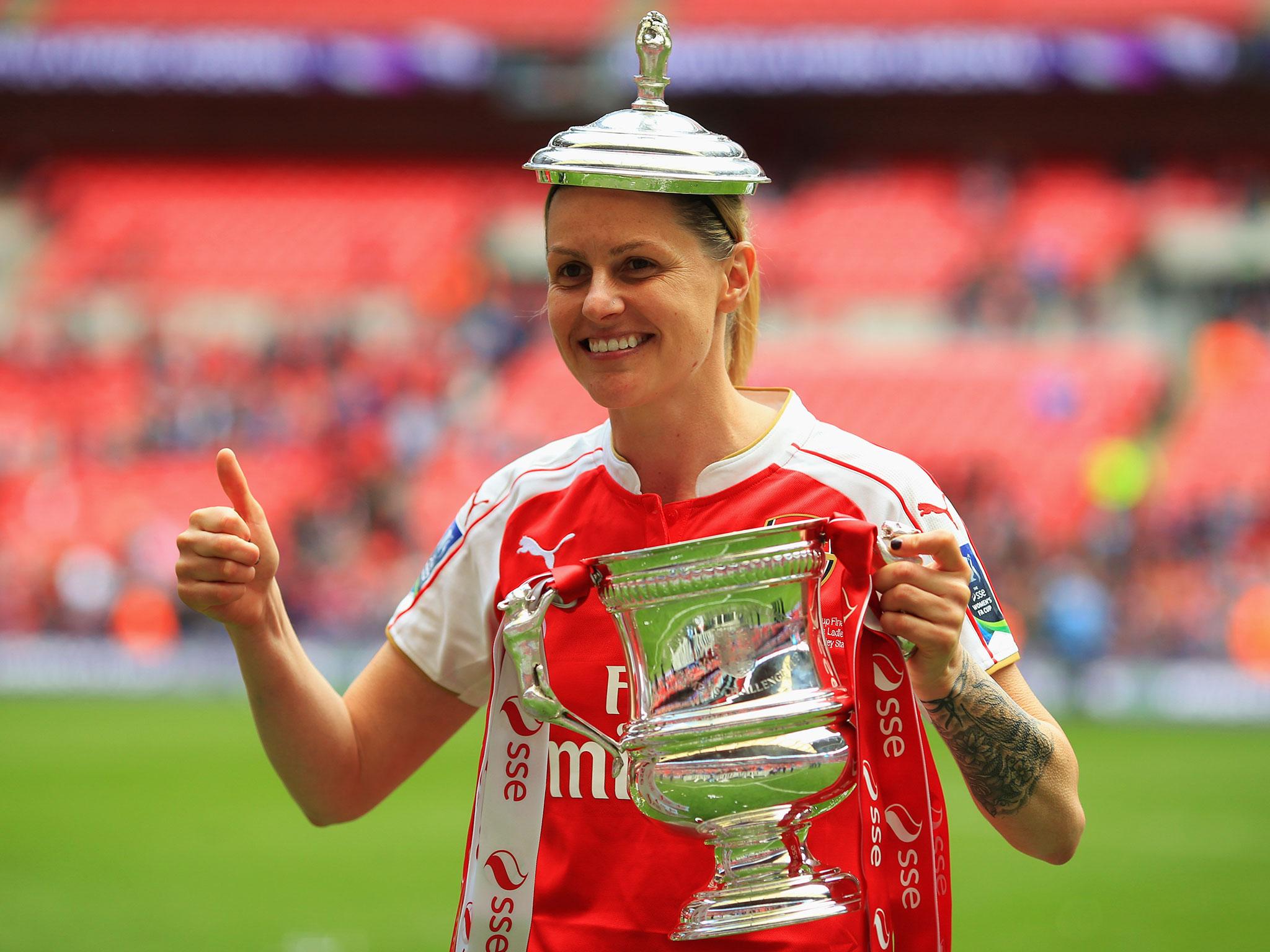 Kelly Smith has retired from women's football to take up a full-time coaching role with Arsenal Ladies