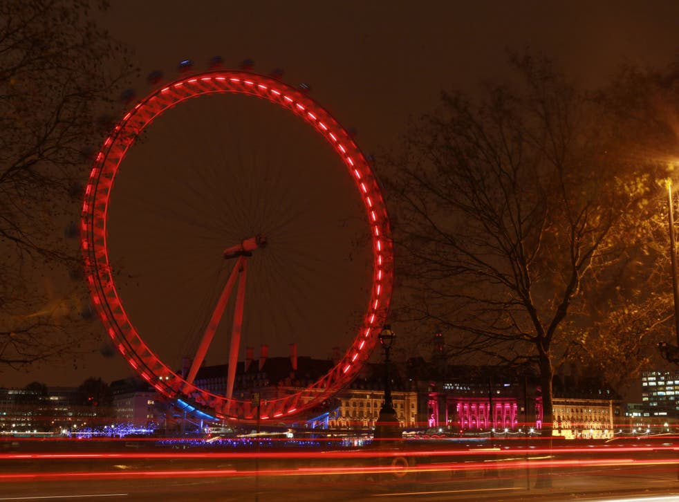 Landmarks in London turn red to mark World AIDS Day on 1 December