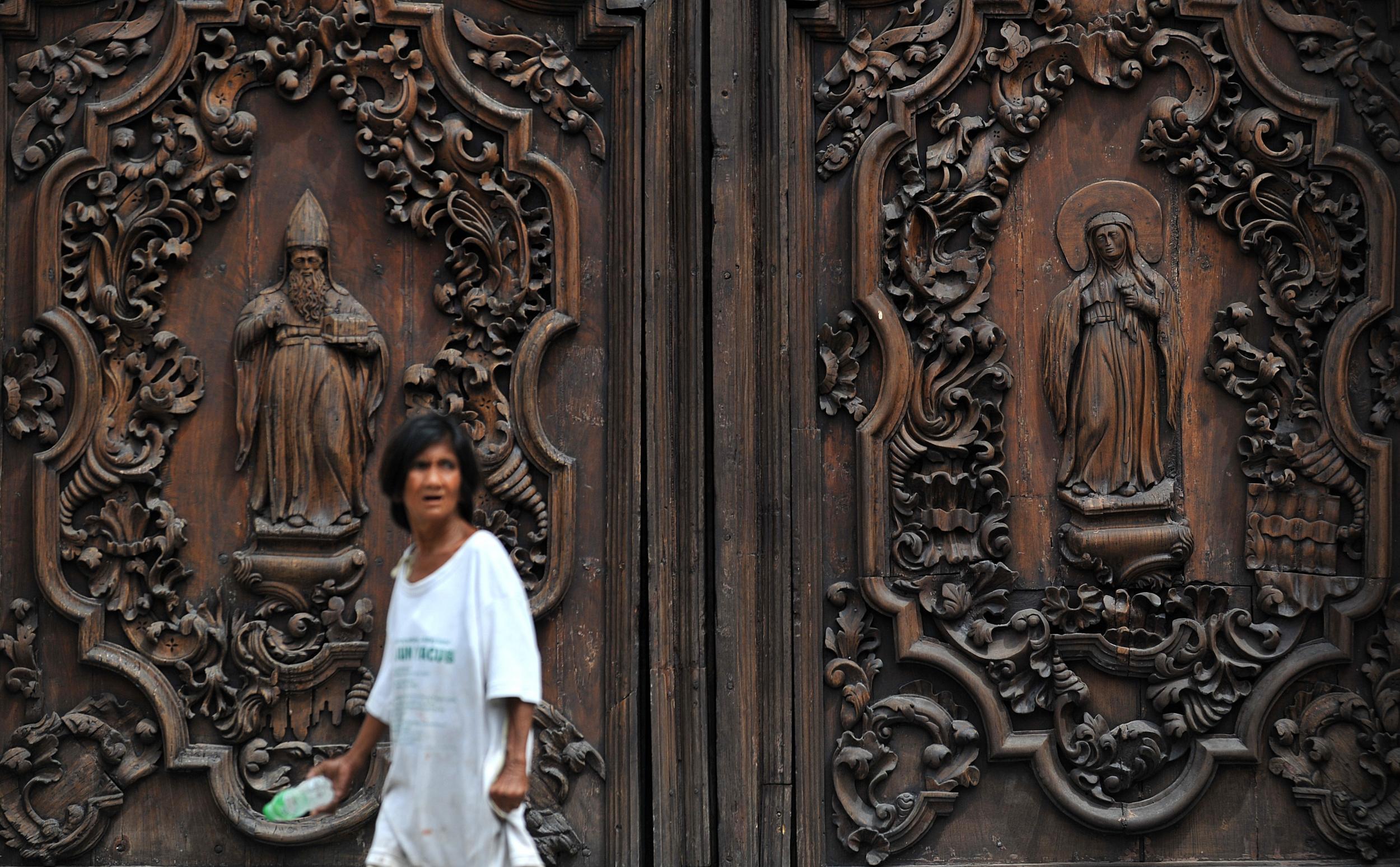 The intricately carved doors of San Augustin Church