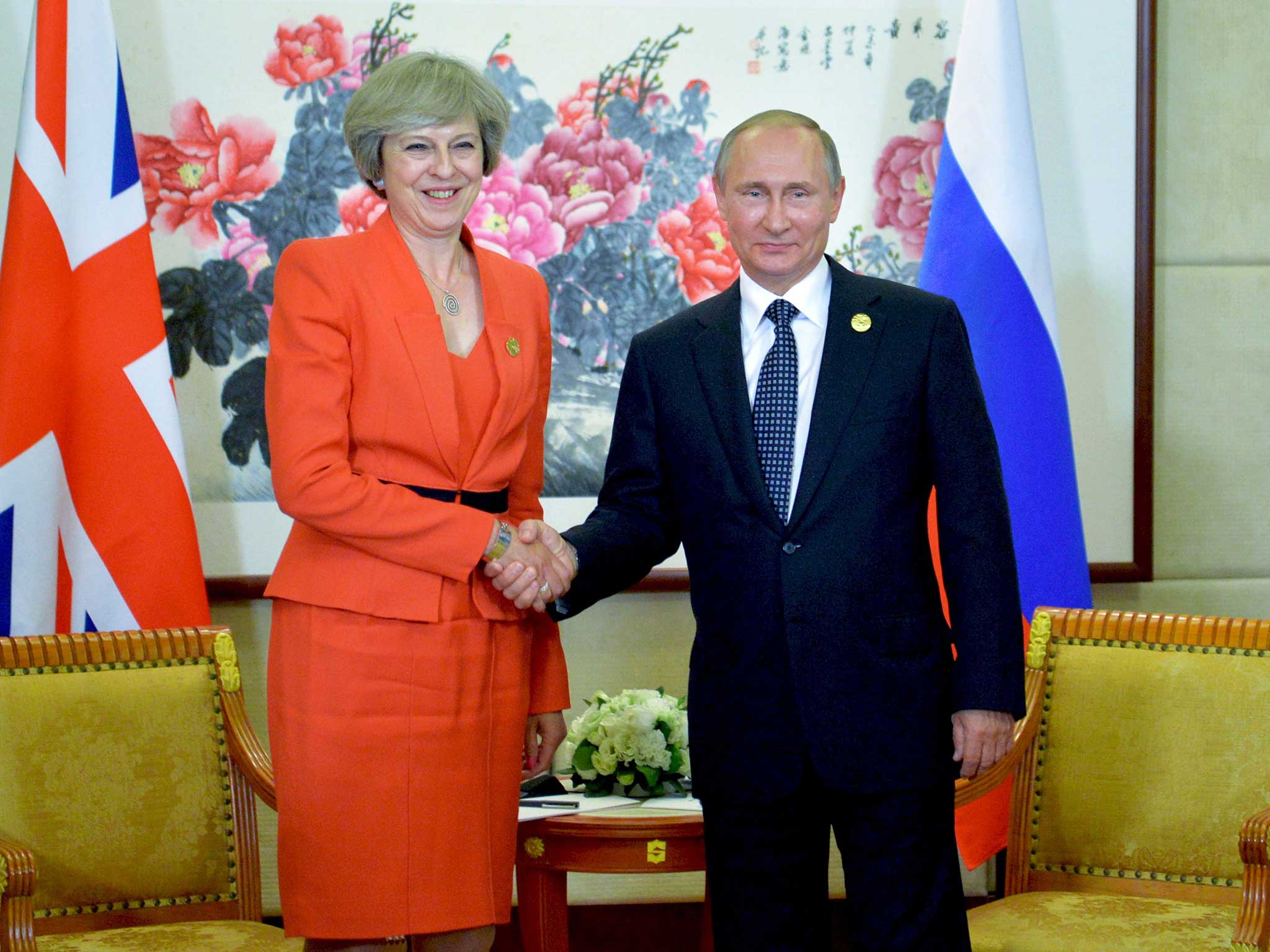 Theresa May meeting Russian President Vladimir Putin in China, last September