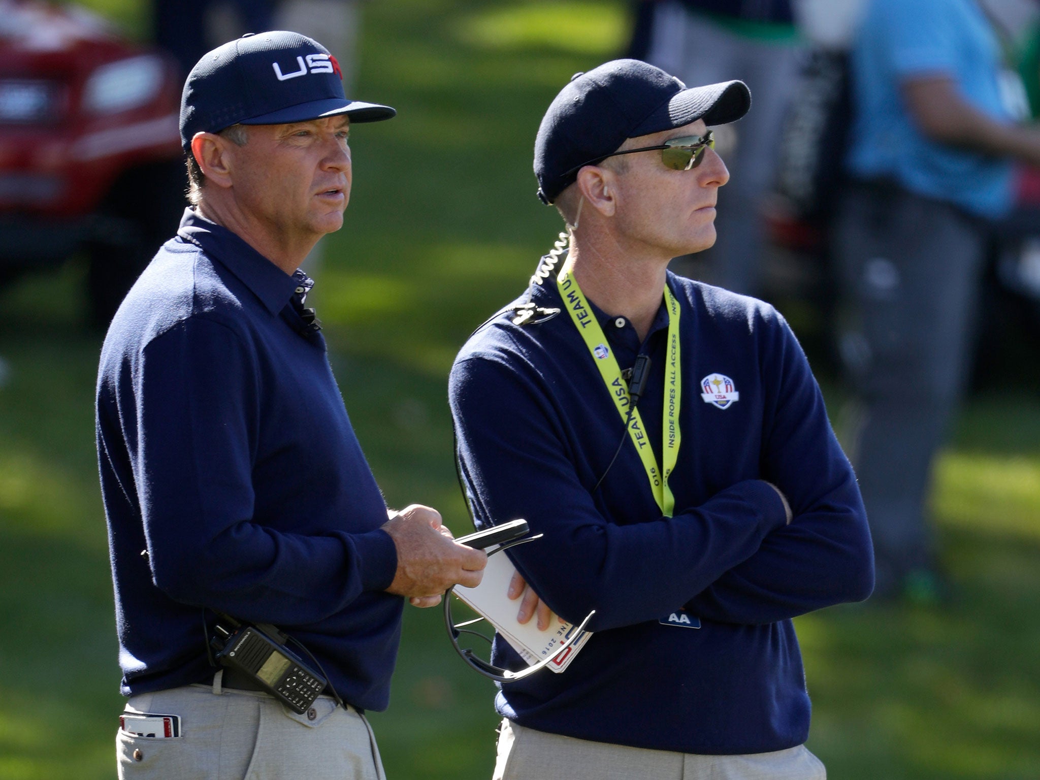 Furyk on duty at last year's Ryder Cup with Davis Love III