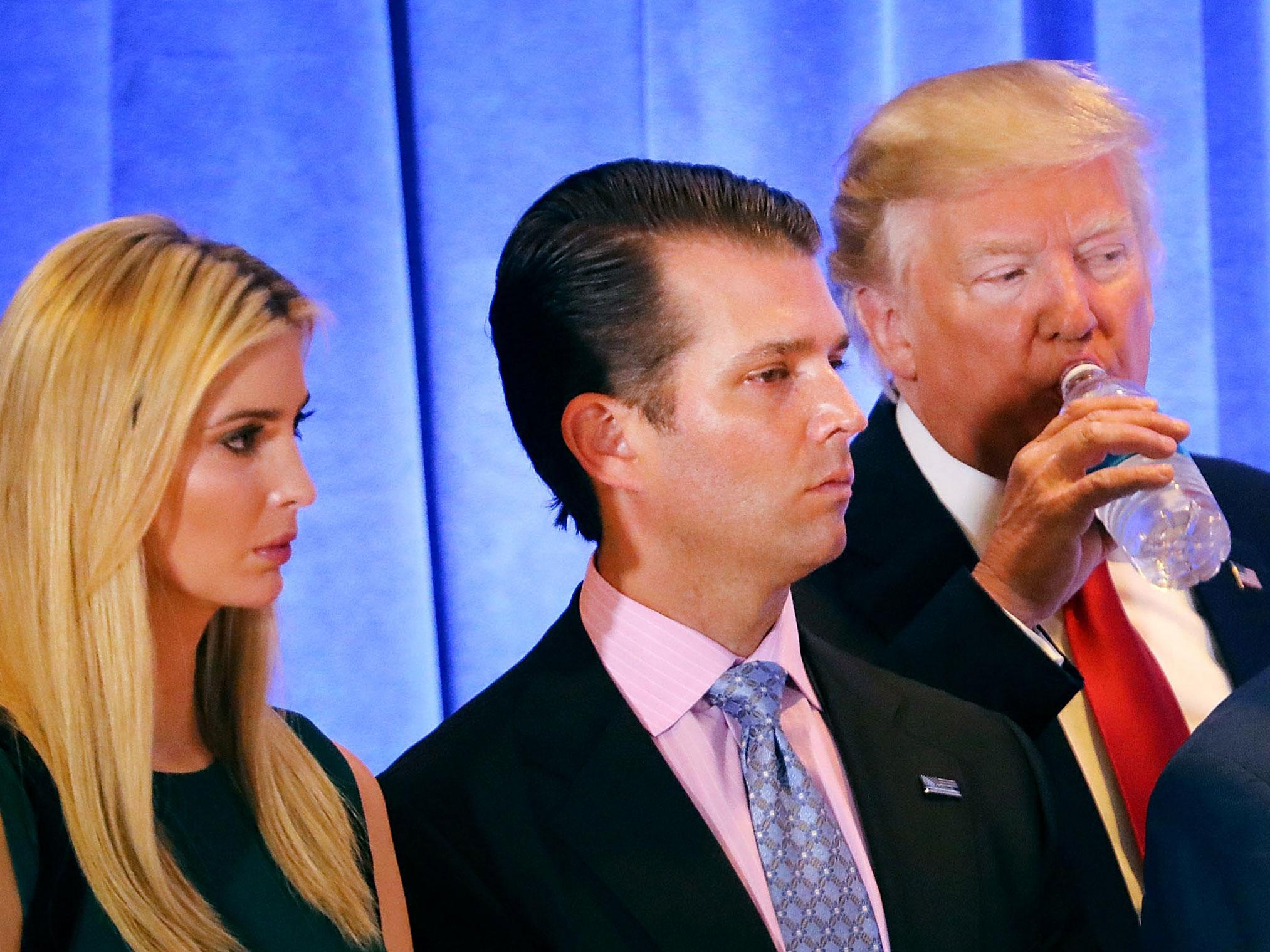Ivanka and Don Jr with their father
