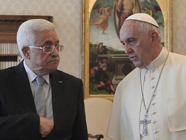 Pope Francis talks with Palestinian president Mahmoud Abbas during a private audience at the Vatican City in 2015