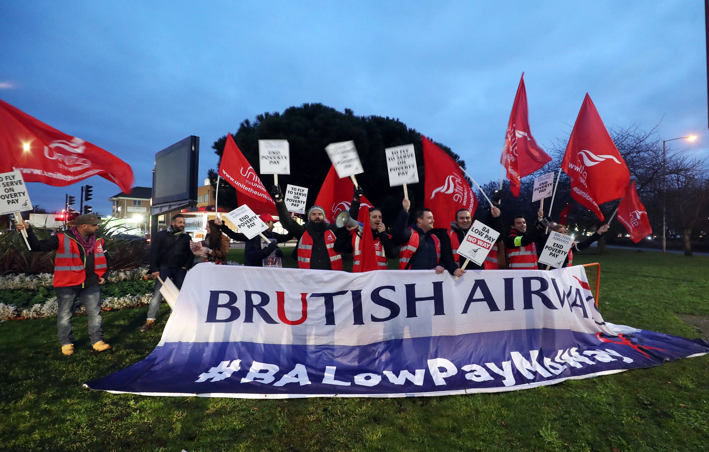 British Airways cabin crew members at a recent 48 hour strike in a row over pay protest near Heathrow.