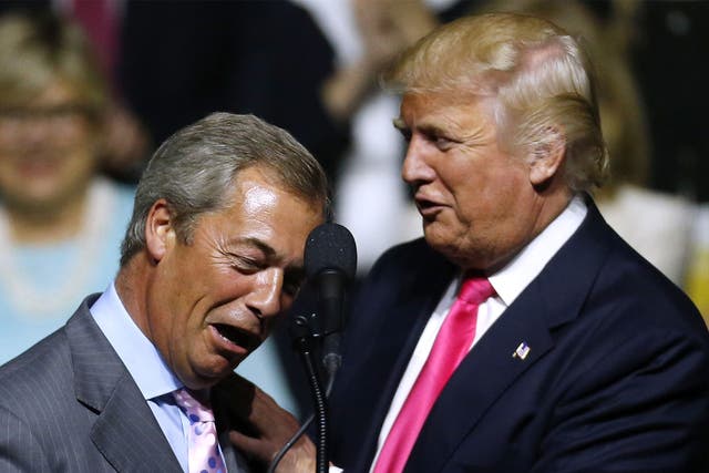 Donald Trump, right, greeting former Ukip leader Nigel Farage during a campaign rally in August 2016