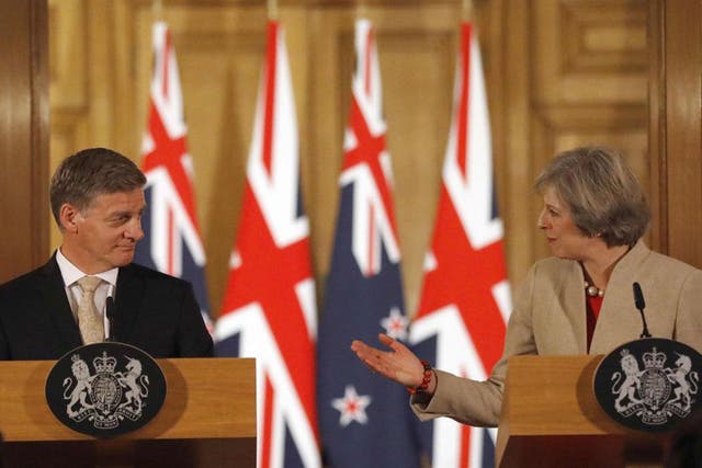 British Prime Minister Theresa May (R) and New Zealand Prime Minister Bill English give a press conference at 10 Downing Street in London
