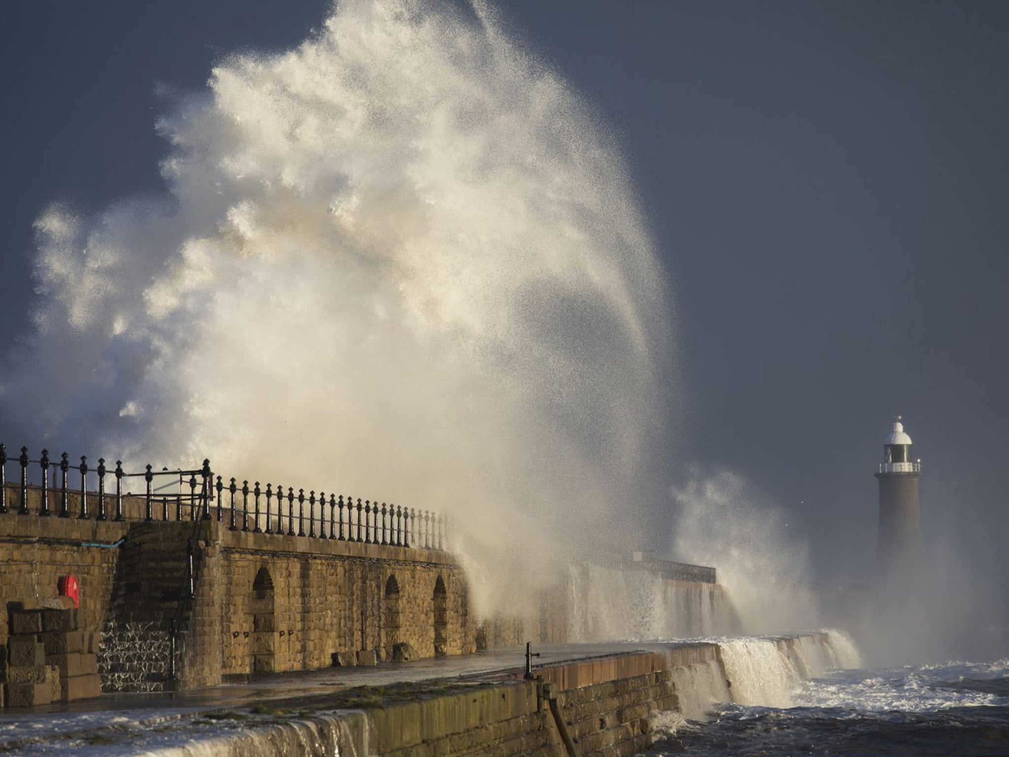 Strong winds sent high waves crashing over Tynemouth Pier in Tyneside on Friday