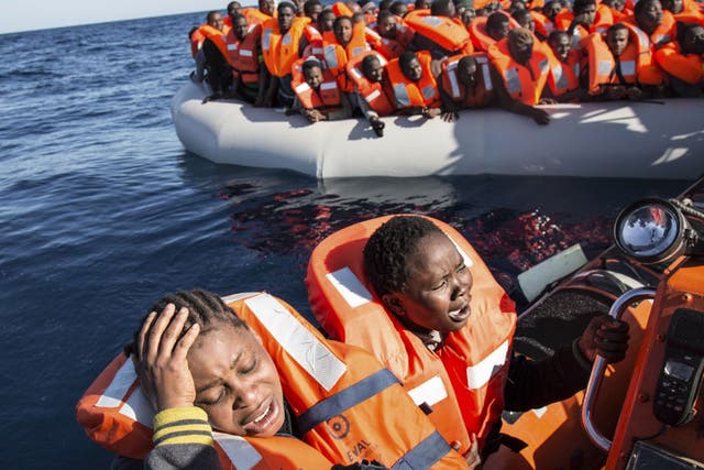 Women being rescued by the Aquarius humanitarian ship from a refugee boat in the Mediterranean in January