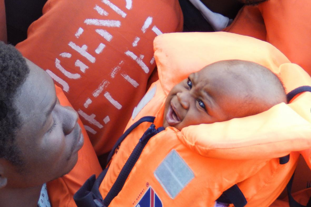 A baby among refugees on a boat carrying 185 people off the coast of Libya. Photo: Lizzie Dearden