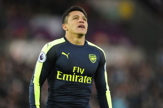 Alexis Sanchez was unhappy at being substituted during Arsenal's 4-0 win over Swansea