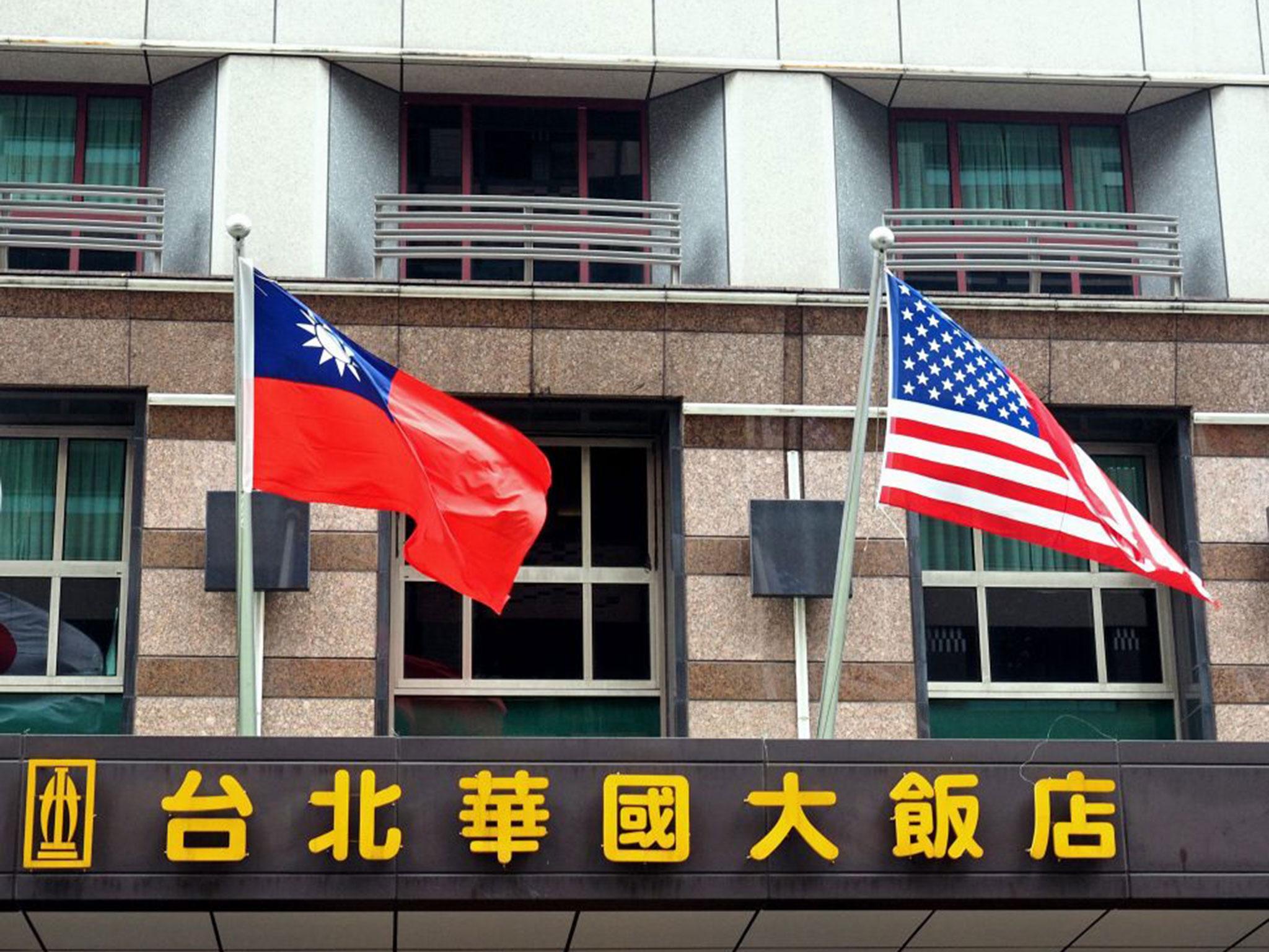 The national flags of Taiwan (L) and the US (R) hanging outside the Imperial Hotel Taipei in Taipei, Taiwan, 14 January 2017. Diplomatic relations between the United States and the Asian region are expected to change as US President-elect Donald Trump has said that the 'One China' policy on Taiwan is up for negotiation under his administration.