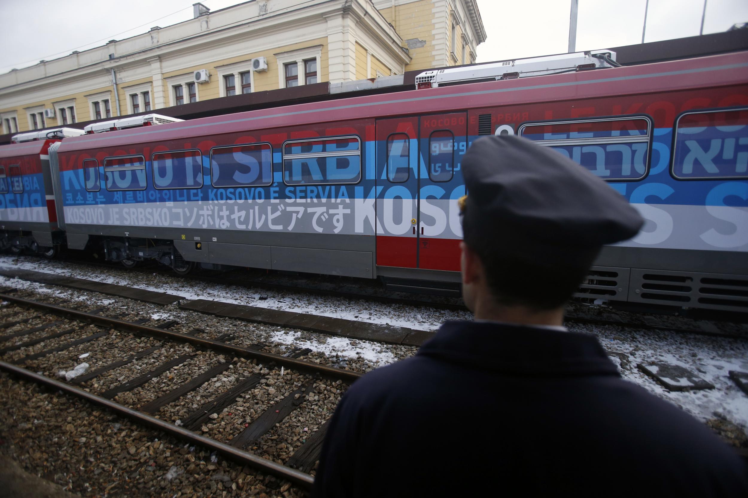 A Russian-made train meant to link Serbia and Kosovo was covered with giant colourful slogans