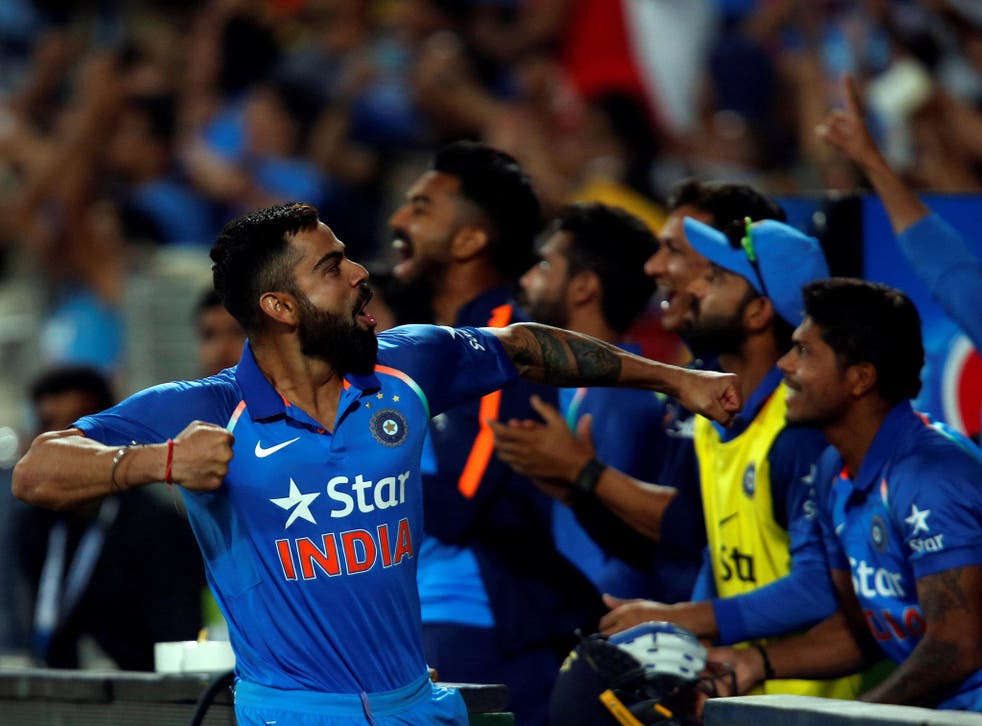 India's captain Virat Kohli celebrates after winning the match